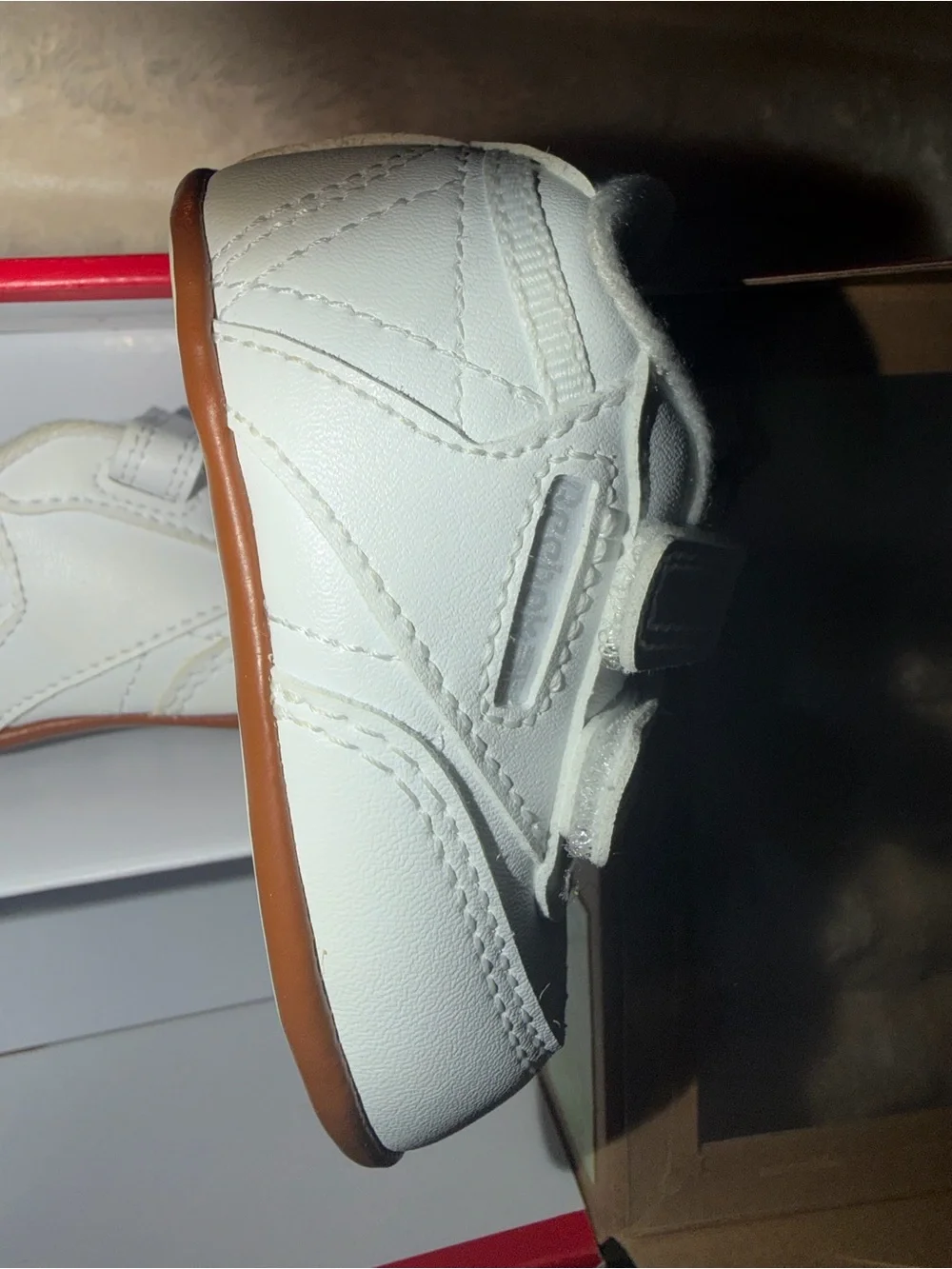 Reebok Women’s White Leather Sneakers with Brown Trim
